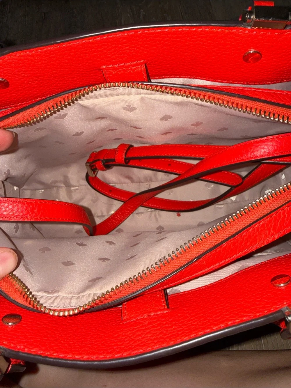 kate spade red pebbled leather satchel with polished hardware